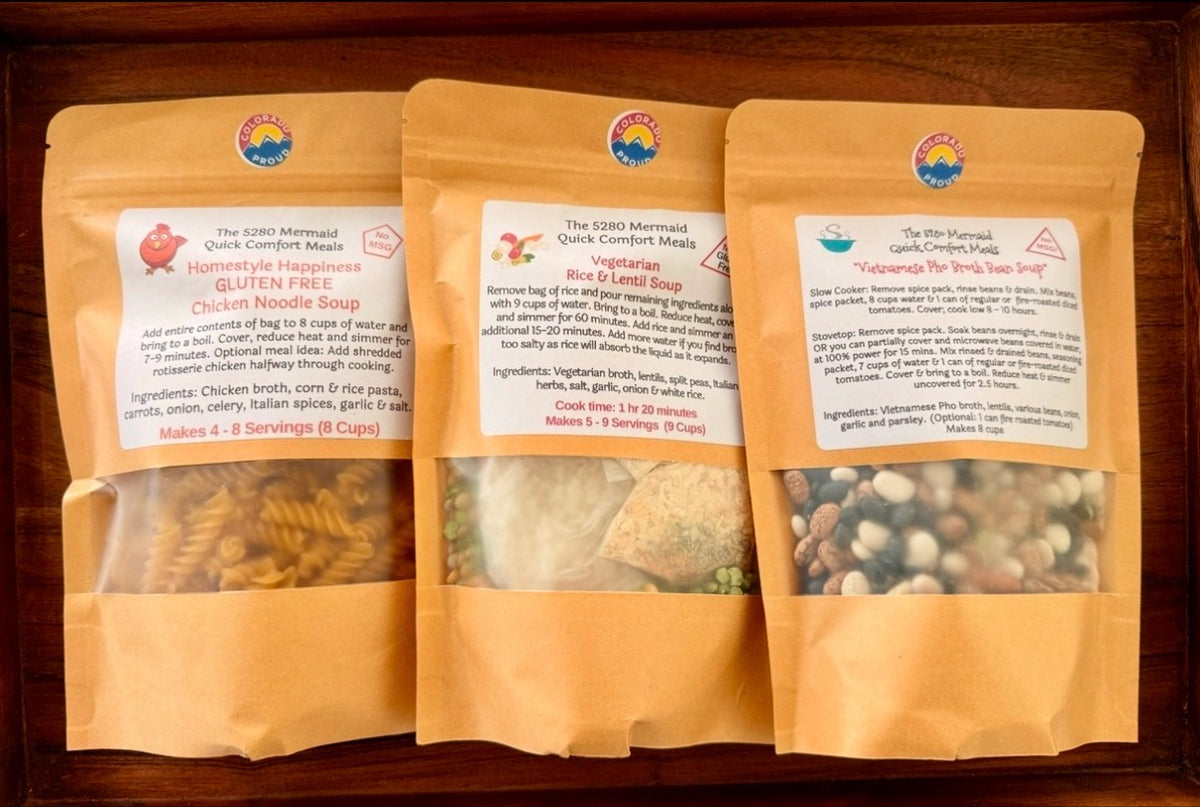 Three The 5280 Mermaid soup pouches: Chicken Noodle Soup, Vegetarian Rice and Lentil Soup, Vietnamese Pho Broth Bean Soup